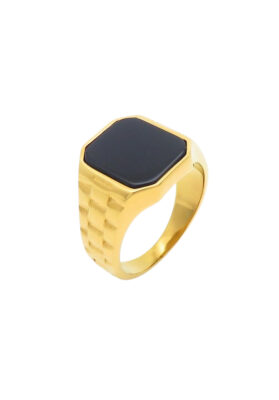 Gold signet ring with black onyx centerpiece and textured geometric band