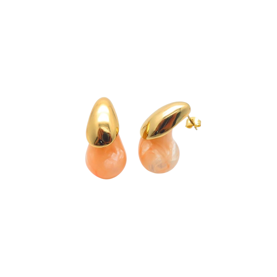 A pair of gold stud earrings featuring a large, vibrant crystal, set in a classic and elegant design.