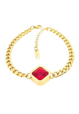 A stunning gold bracelet featuring a deep, red crystal centerpiece, offering a bold and sophisticated look for any occasion.